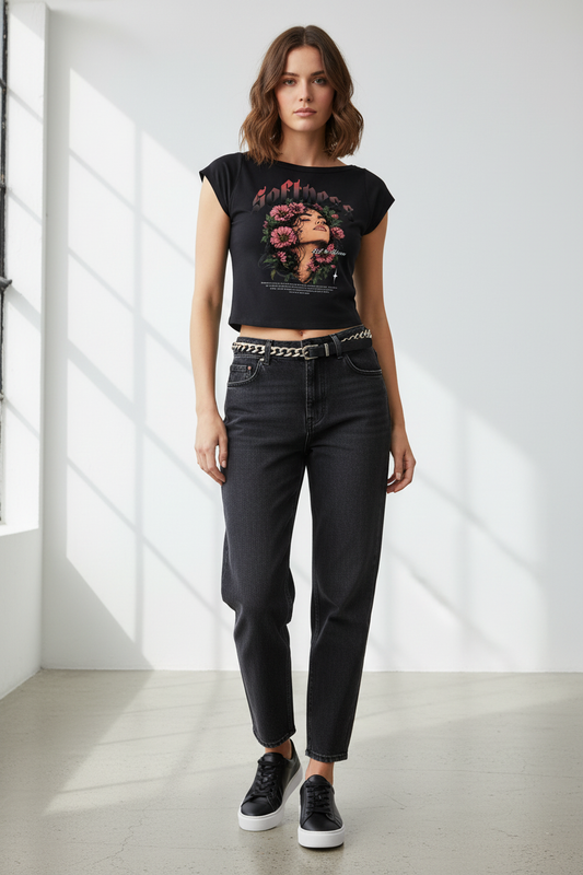 Woman wearing the Essential Wide Neck Crop Tee in a clean editorial studio setting